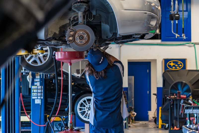 Subaru WRX on the lift at M45 Automotive in Auburn, CA